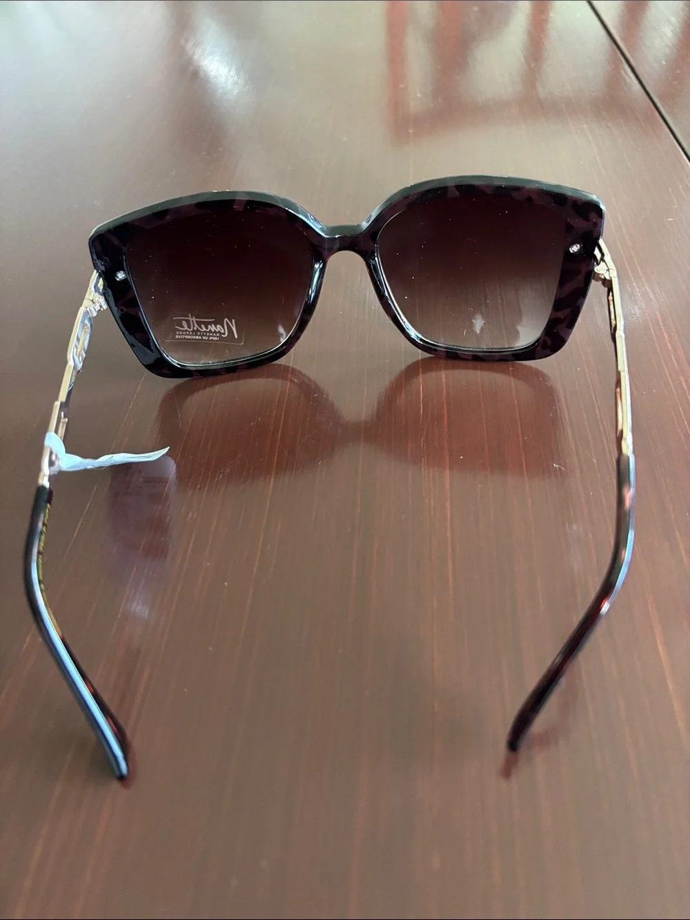Nanette Lepore 100% UV protection,cat eye tortoise frame,gold chain arm,CAT 3,